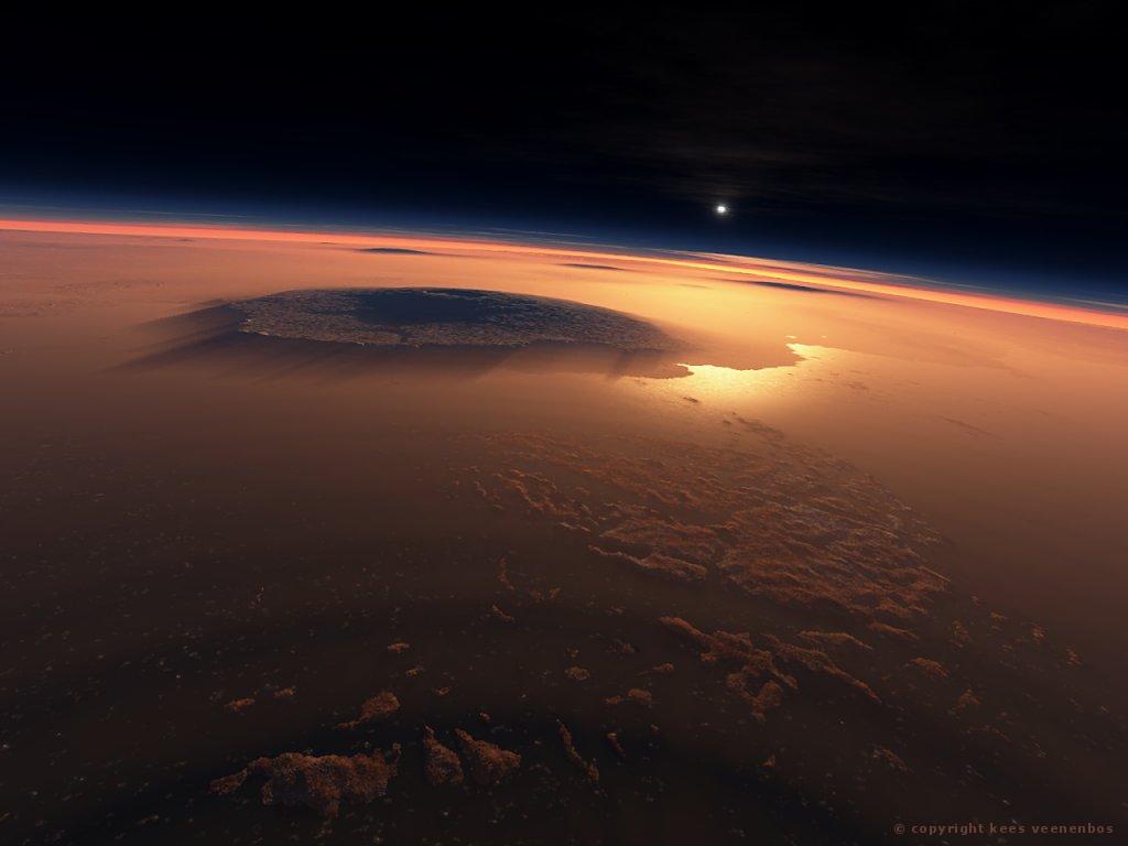奥林帕斯山和远处的塔尔西斯山，太阳已经升起，照亮了这四座山峰。Courtesy NASA/JPL-Caltech